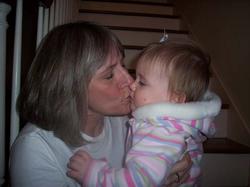 mom with mccanless kiss.jpg